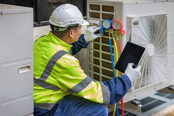 Professional Air Duct Cleaning technician working in Gladstone, OR